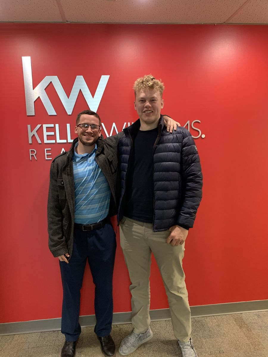 Kyle Keenan with clients on closing day 1