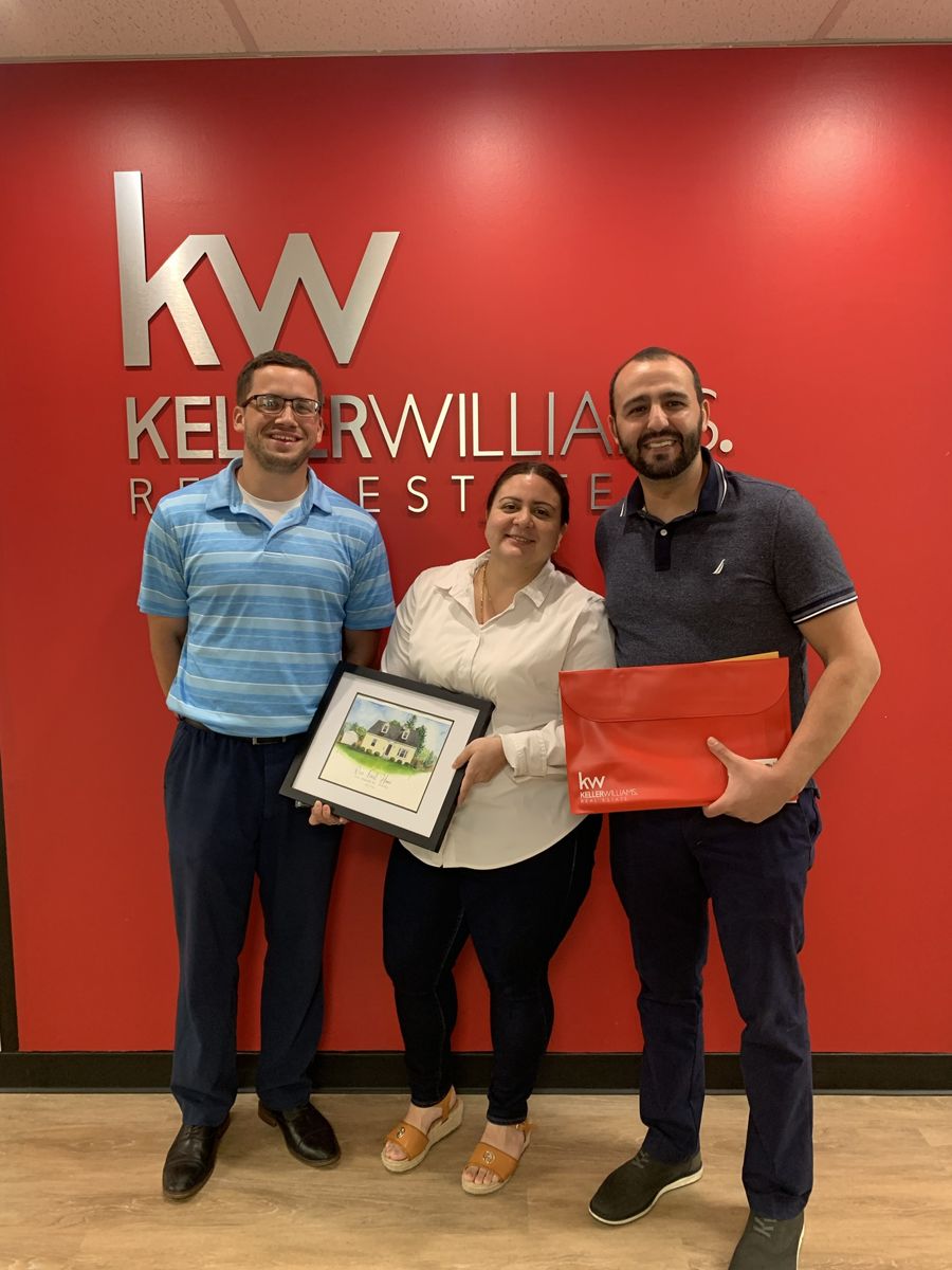 Kyle Keenan with clients on closing day 3