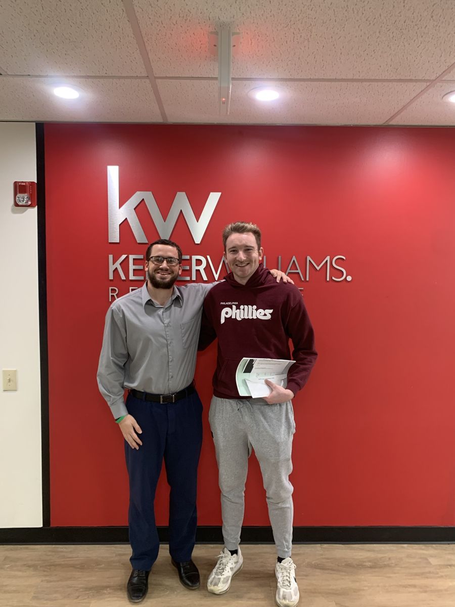 Kyle Keenan with clients on closing day 4