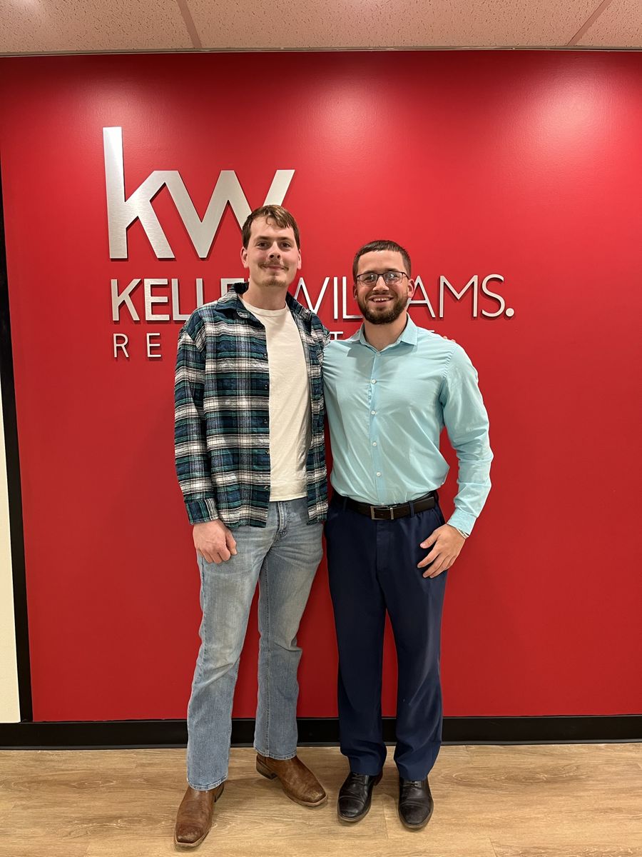 Kyle Keenan with clients on closing day 5